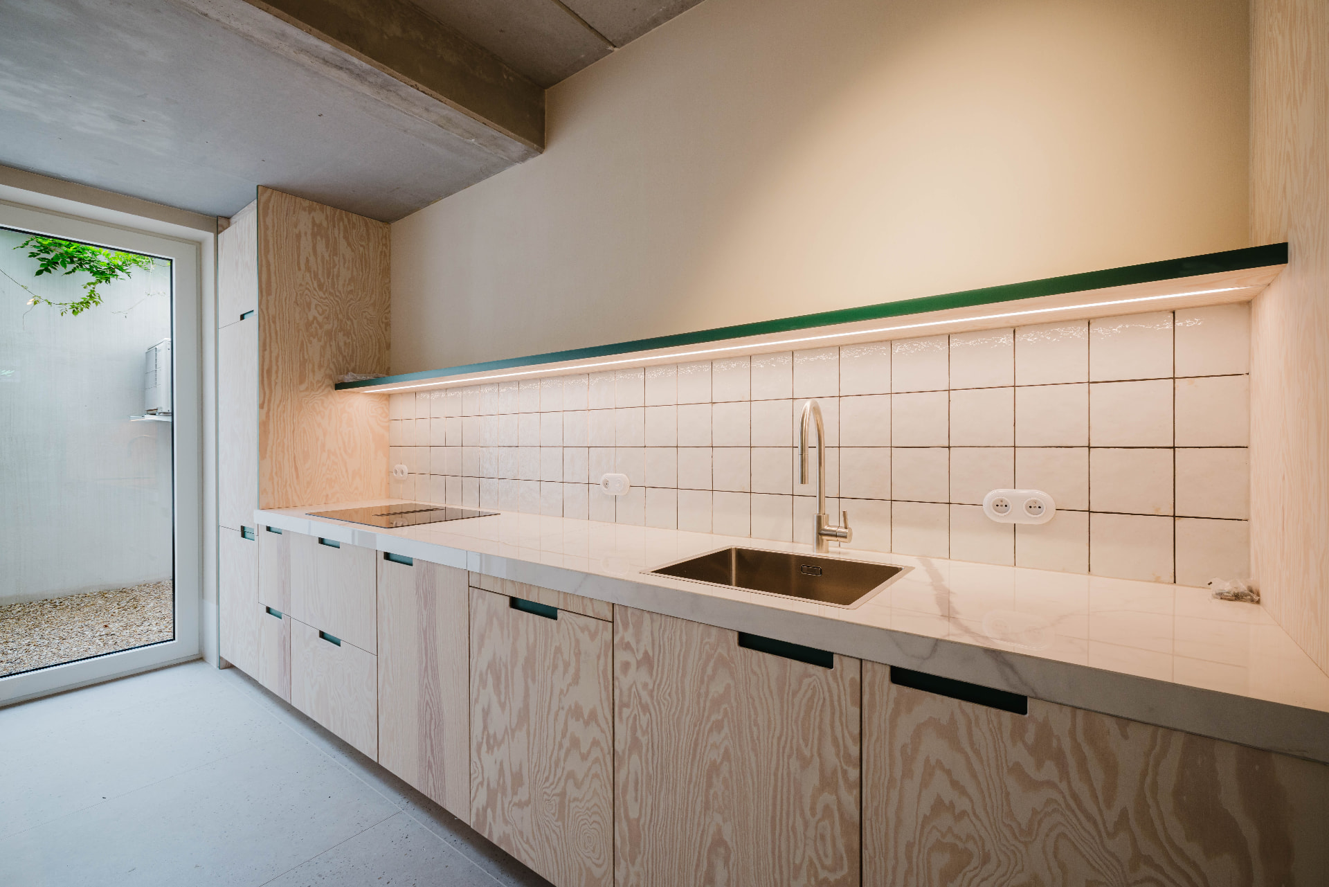Kitchen with green light shelf