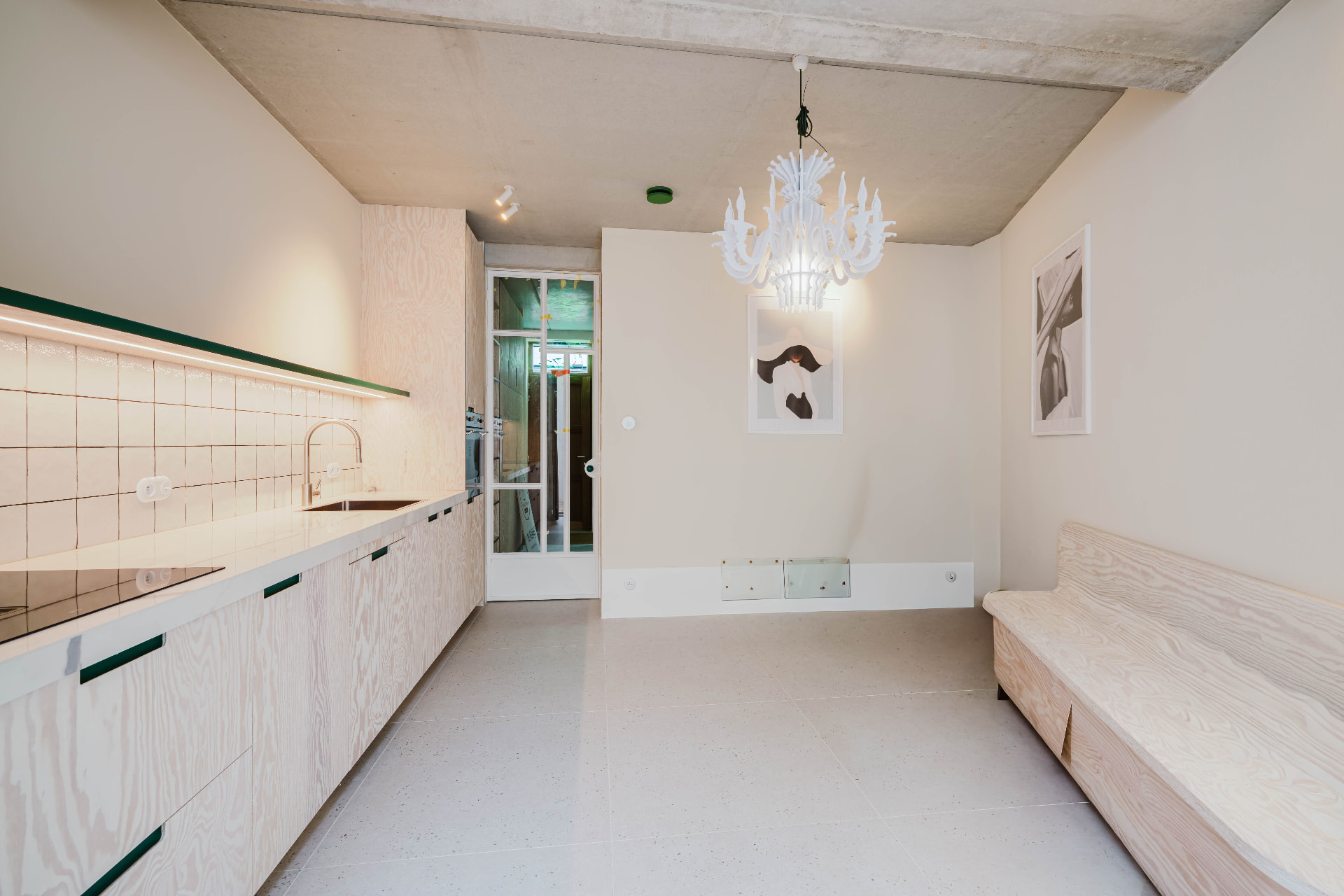 Dining area with chandelier and built-in bench