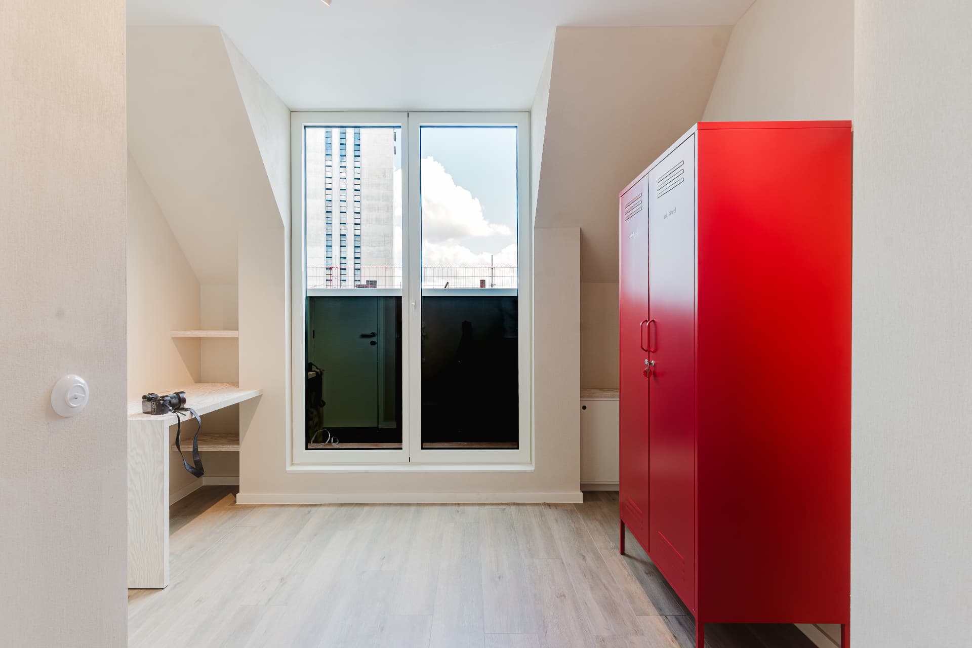 Bedroom with the red wardrobe